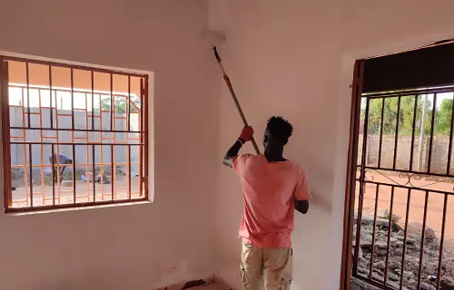 Interior painting service in The Gambia by Pabi's Painting – vibrant living room makeover